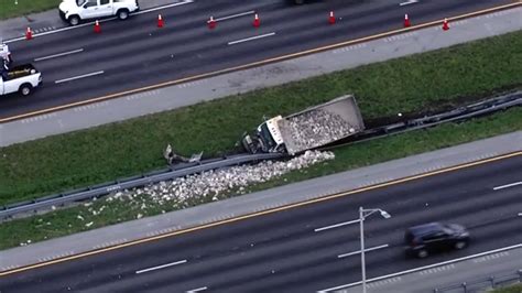 Dump truck rolls over on I-75 in Weston; no injuries reported